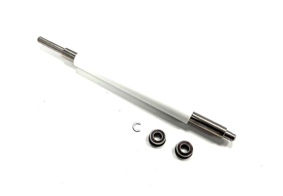 WHITE ZEBRA PLATEN ROLLER WITH THREE SMALL ROUND PARTS NEXT TO IT, ON A WHITE BACKGROUND