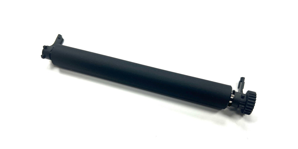 Black cylindrical object with attachments on a white background