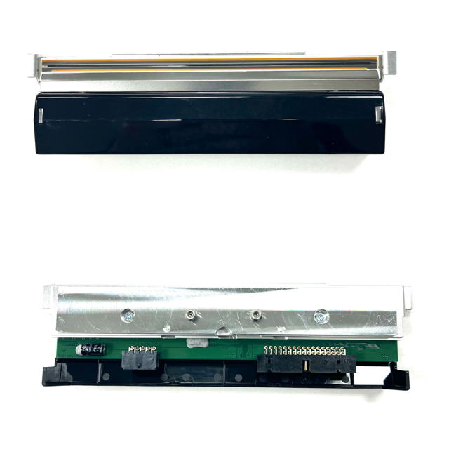 Close-up of a printer ribbon cartridge on a white background