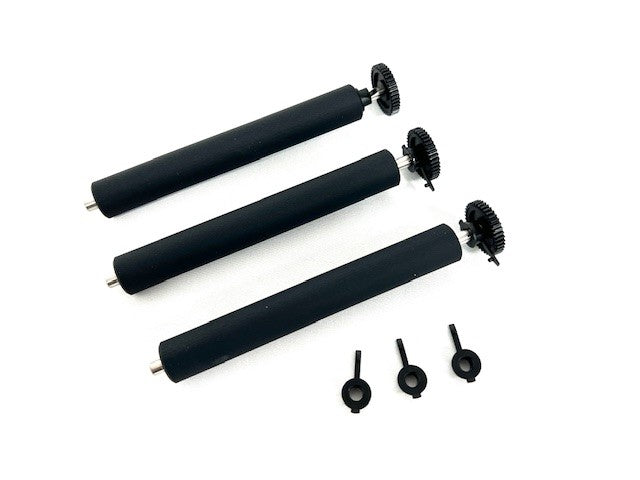Set of black rollers and gears on a white background